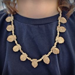 Tulsi neck beads with Radha on round leaf